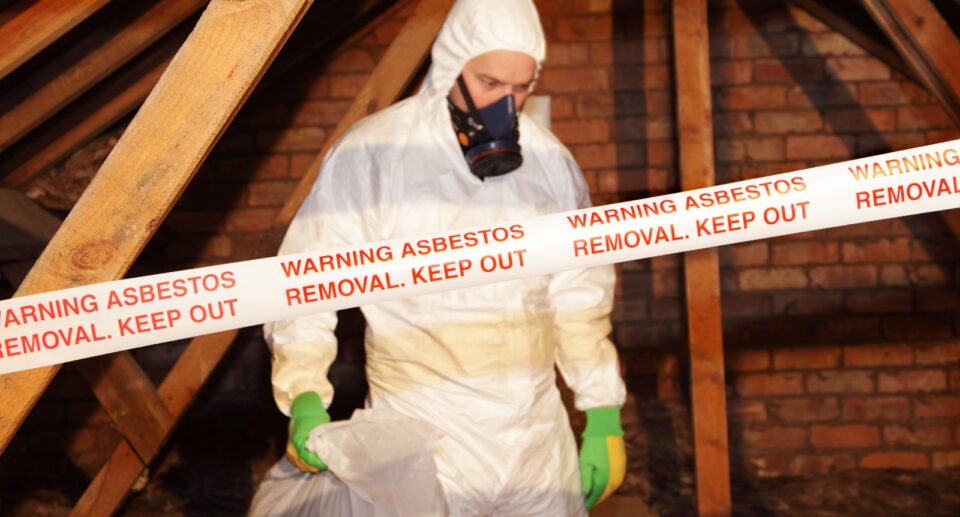 man removing asbestos